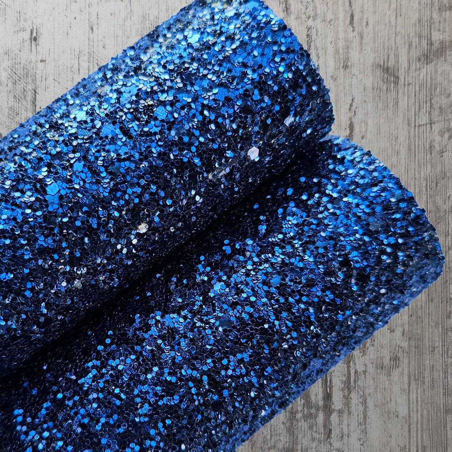 Deadly dark blue glitter fabric